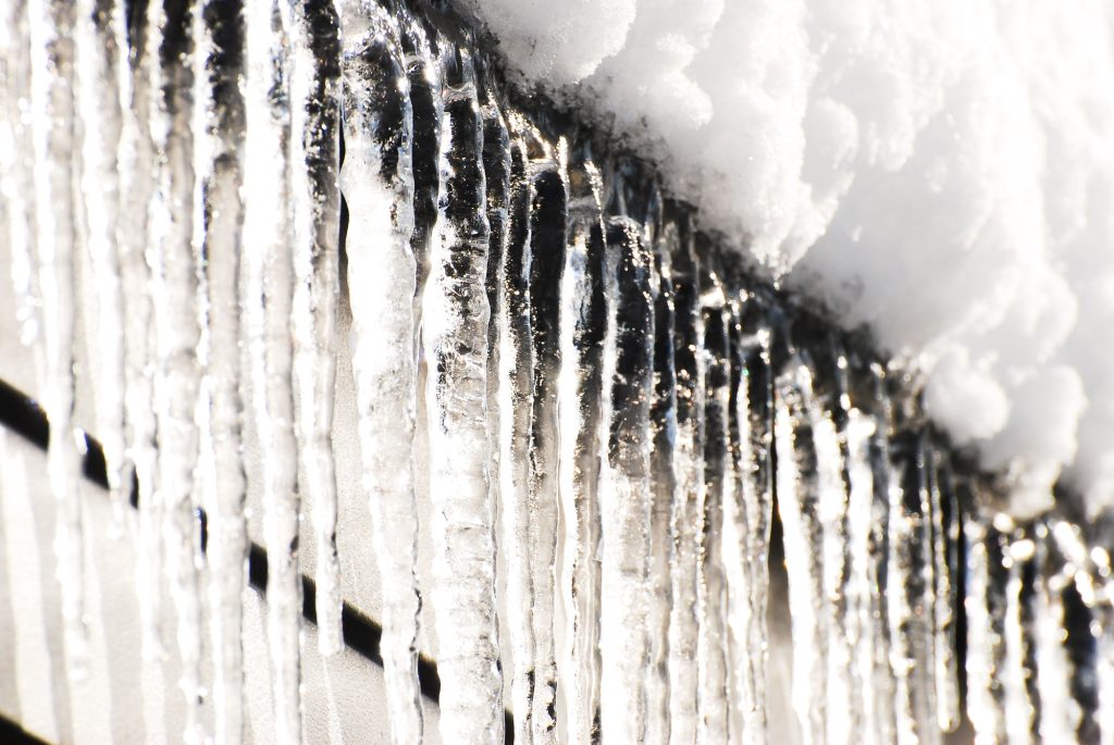 icicles hanging from a roof